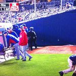 The Rangers may want to watch out for rowdy Yankee fans as well, after what happened during Game 3's 8-0 shellacking. According to CrossingBroad, TBS cameras caught a stadium attendant picking up bottles, debris, and a foam finger from the Rangers' bullpen as Yankees fans chorused an "asshole" chant. 